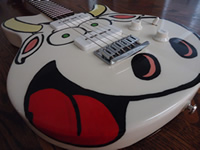 Cow Guitar front bottom